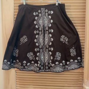 Willie Smith silver embroidery on brown skirt